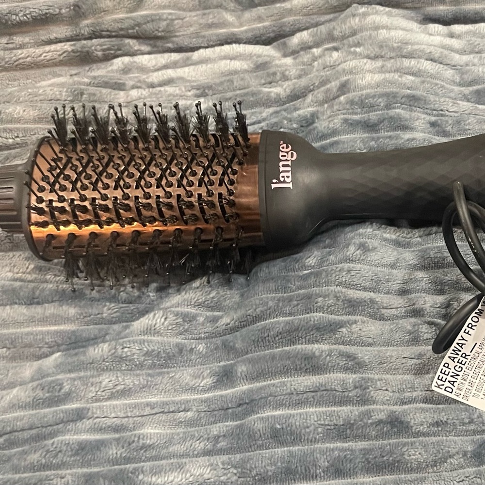 Lange titanium volumizing hair dryer. Used once.